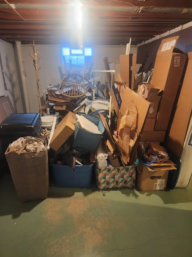 Roll-off dumpster container at job site for Concrete Dumpster Rental in Sherman